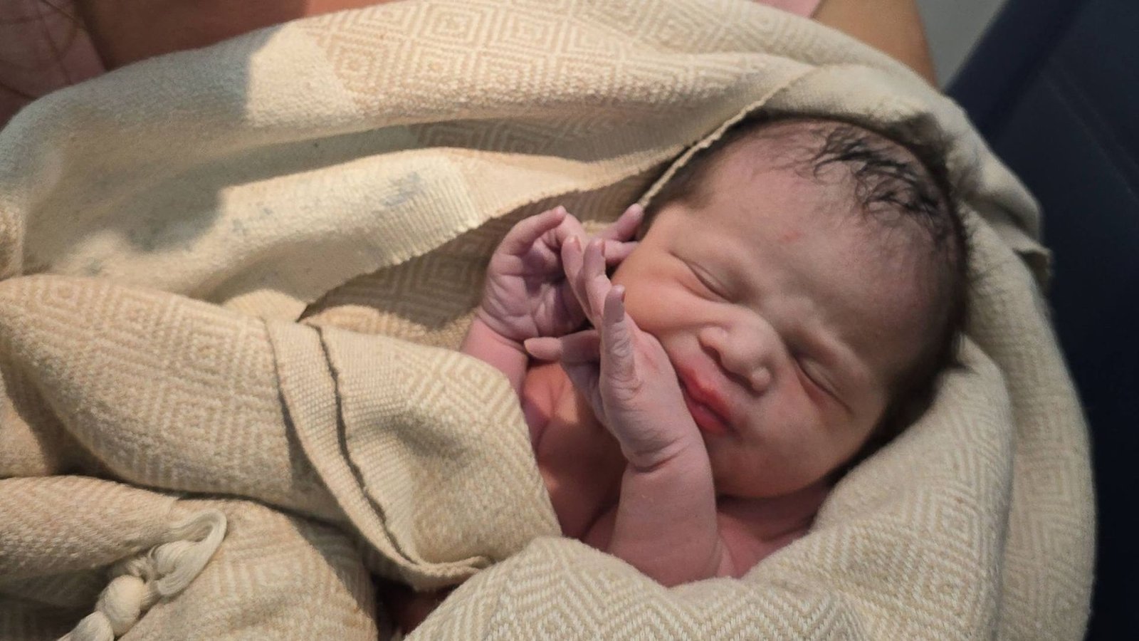 Paramedics help deliver baby during flight after mum goes into labour early