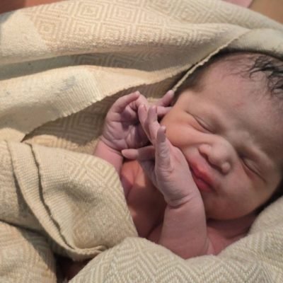 Paramedics help deliver baby during flight after mum goes into labour early